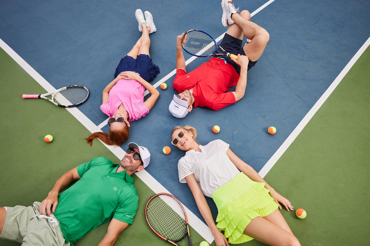 Four chic Tennis Players on the court dressed in Catch + Club sportswear.